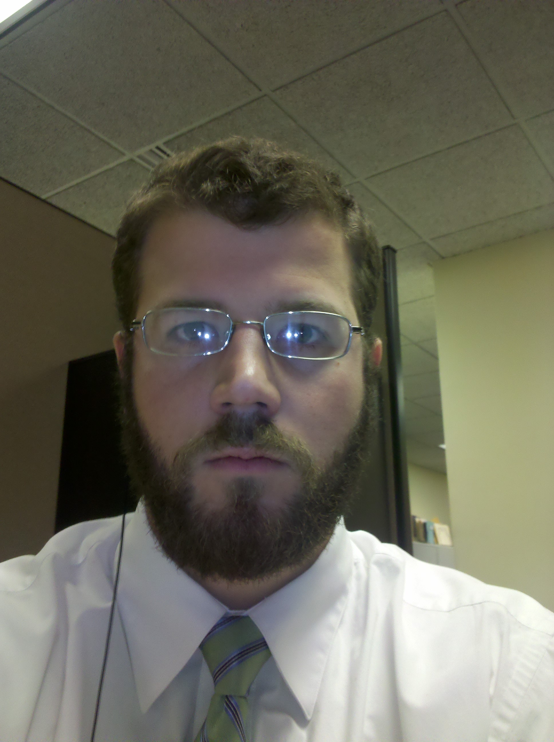 #16 - Craig pulling the beard off at work - IMG_20101206_170033